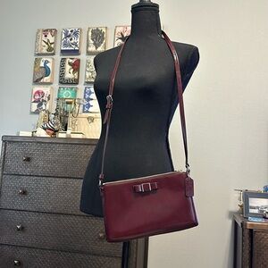 Coach oxblood crossbody patent leather purse